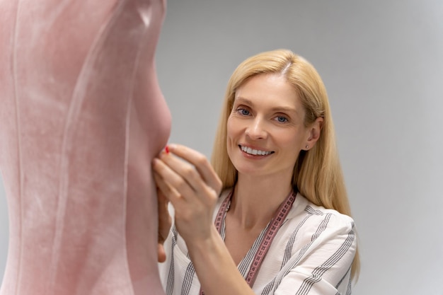 A surgeon consulting with a patient about breast reconstruction surgery in a modern Tunisian clinic