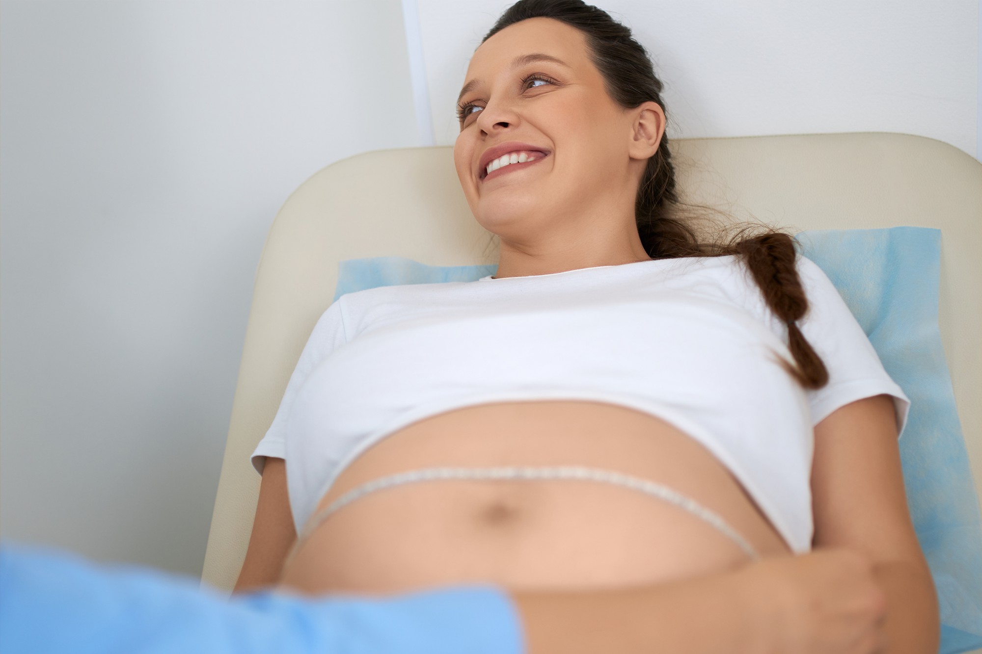 Woman after tummy tuck surgery in Tunisia showing flat stomach