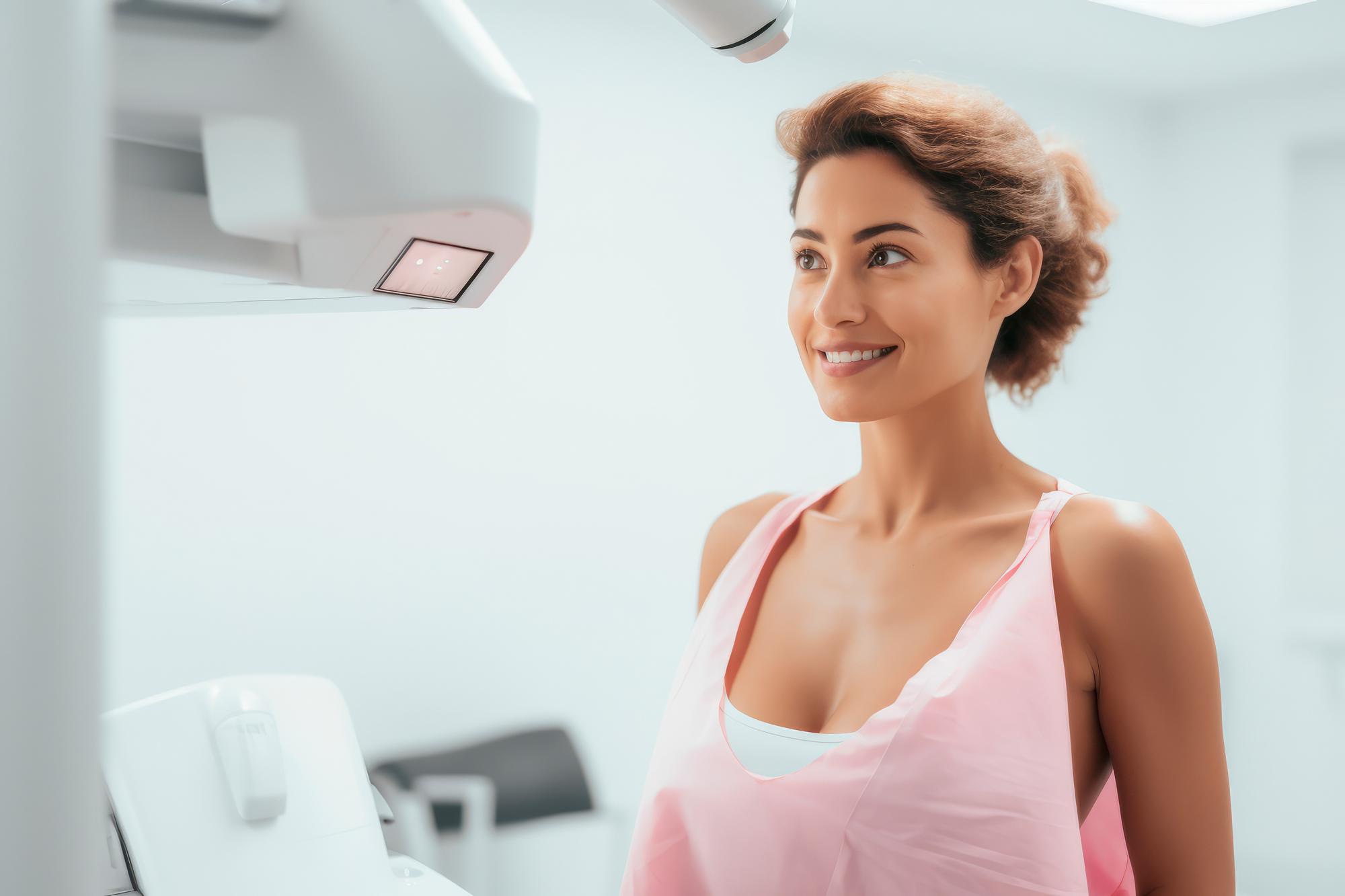 Woman smiling after breast augmentation surgery in Tunisia clinic